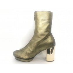 Botín orion oro alto