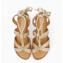 Sandalias planas de piel color dorado trenzadas con cordones