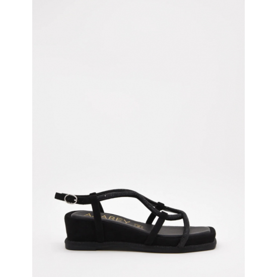 Sandalias planas negras con tiras cruzadas con strass