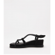 Sandalias planas negras con tiras cruzadas con strass