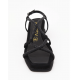 Sandalias planas negras con tiras cruzadas con strass