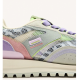 Zapatillas de piel con estampado animal y rejilla.