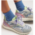 Zapatillas de piel con estampado animal y rejilla.
