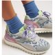 Zapatillas de piel con estampado animal y rejilla.