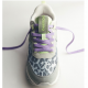 Zapatillas de piel con estampado animal y rejilla.