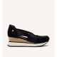 Sandalias de piel con cuña de rafia.